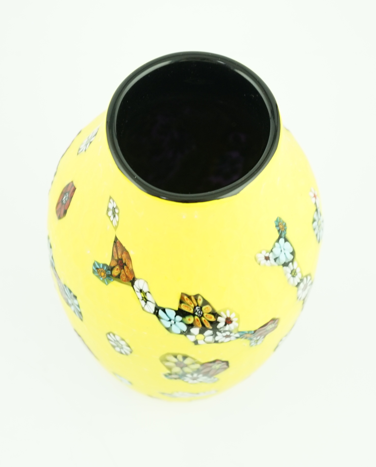 Vittorio Ferro (1932-2012) A Murano glass Murrine vase, the yellow battuto ground, decorated with scattered flower heads, unsigned, 28cm, Please note this lot attracts an additional import tax of 20% on the hammer price